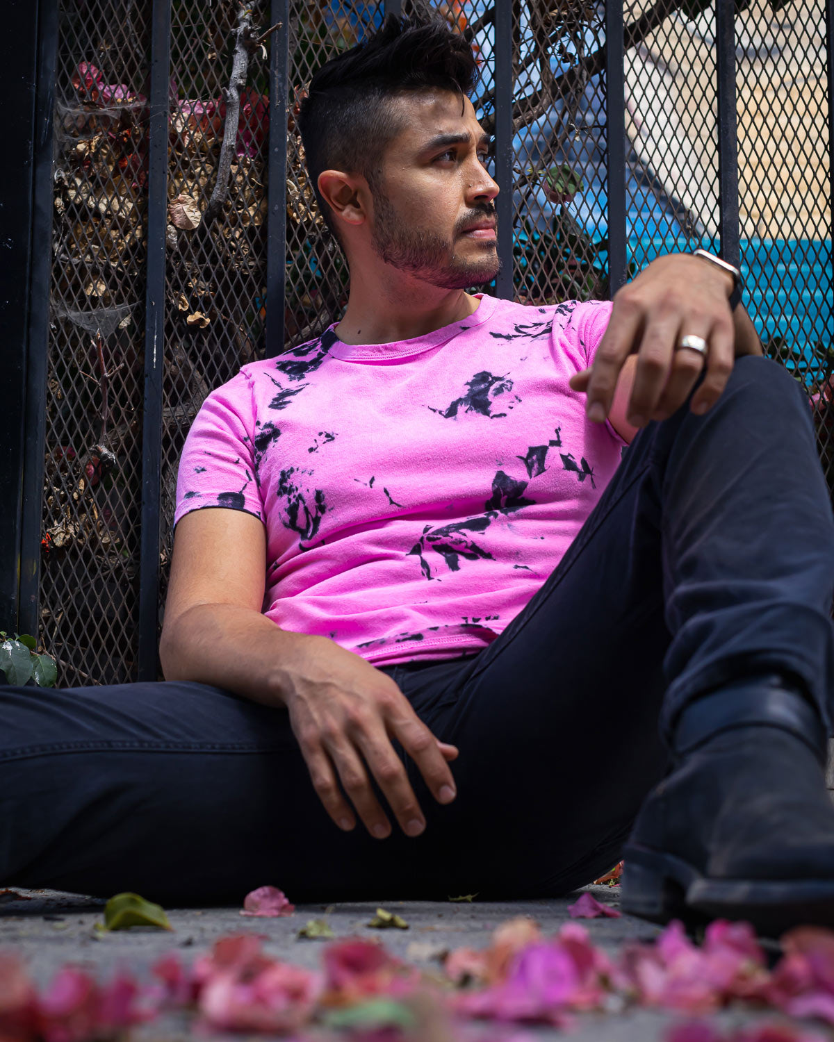 Model wearing pink and black hand dyed tie dye t-shirt