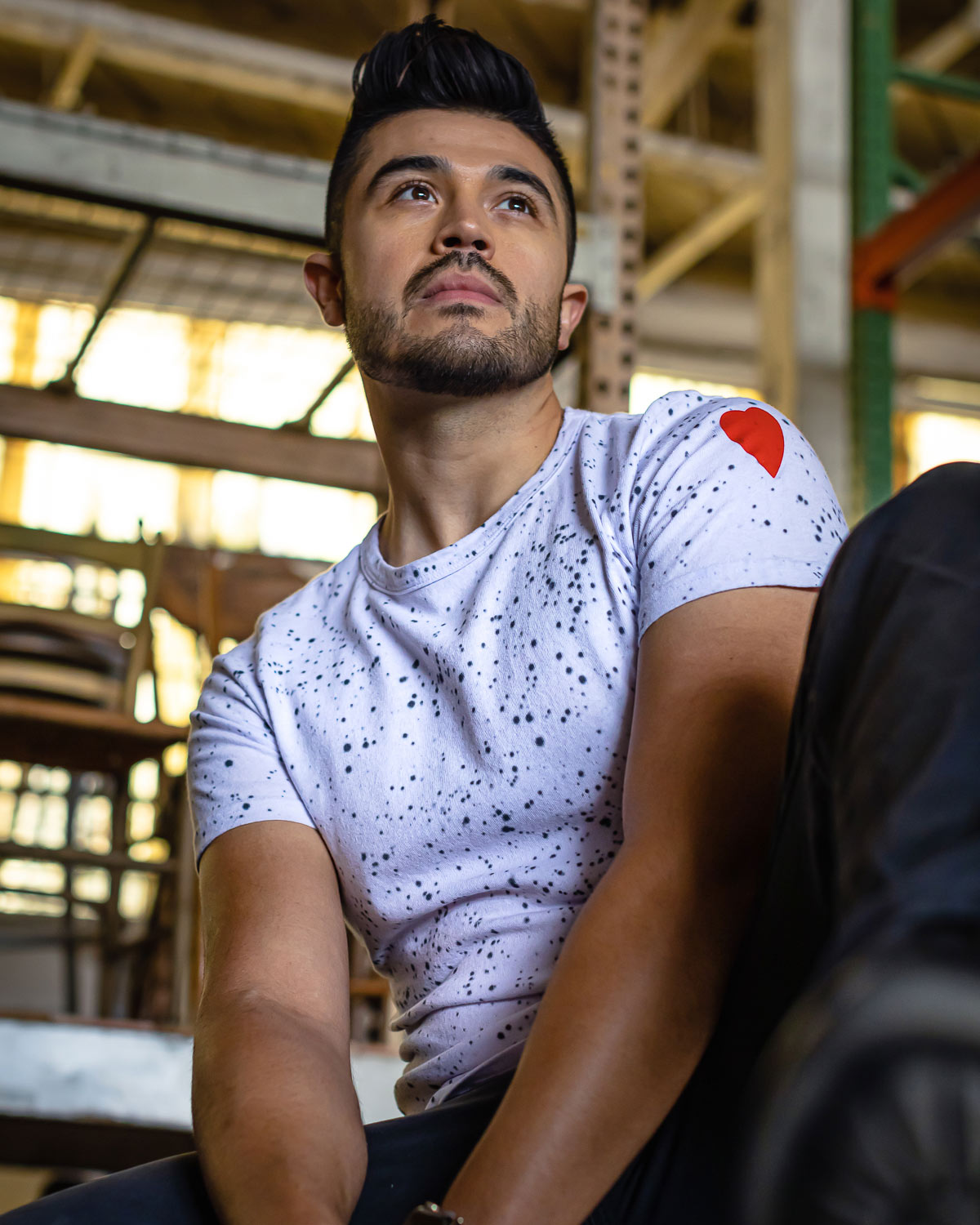 Model wearing white splatter tie dye hand dyed t-shirt
